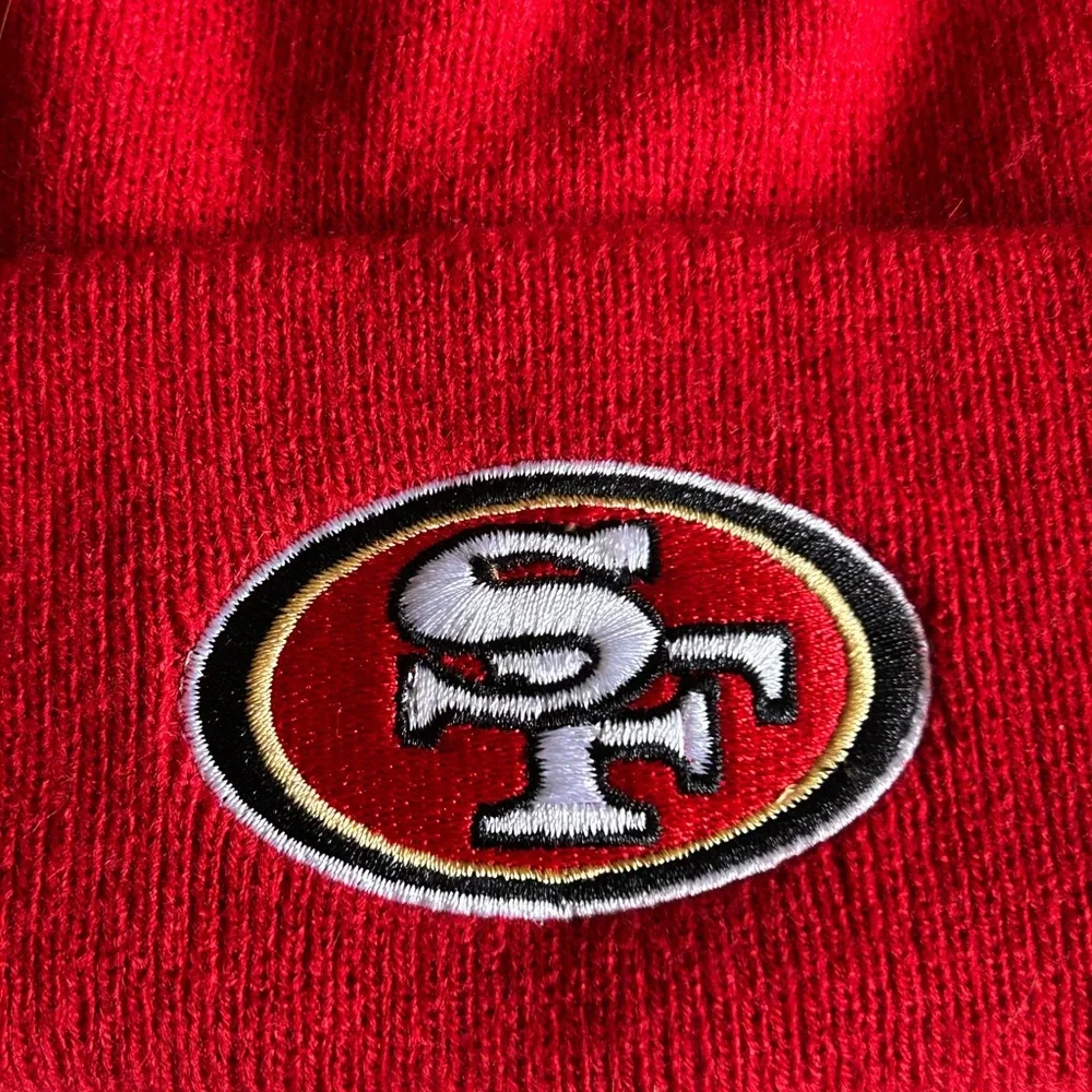 NFL Team Apparel San Francisco 49ers Youth Cuffed Knit Hat With Pom‎